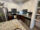 Apartment kitchen featuring stainless steel appliances