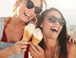 Two young women enjoying ice cream