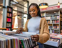 young woman shopping for records
