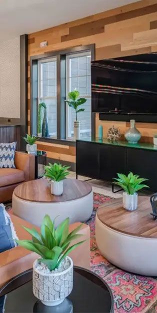 a lounge area with a TV
