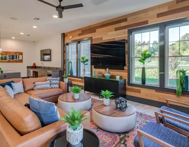 lounge area with a TV